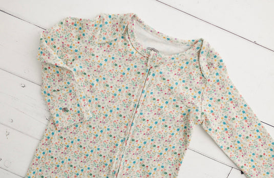 Organic cotton romper with small flowers, khaki and lilac